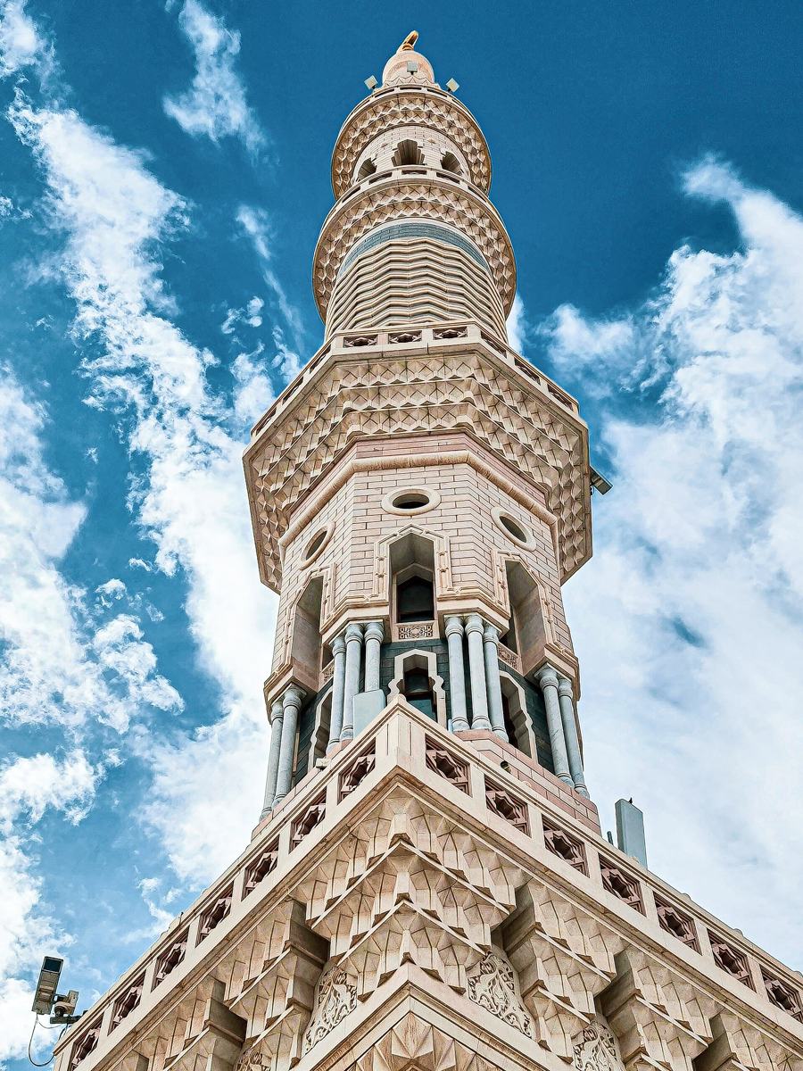 A minaret against a blue sky